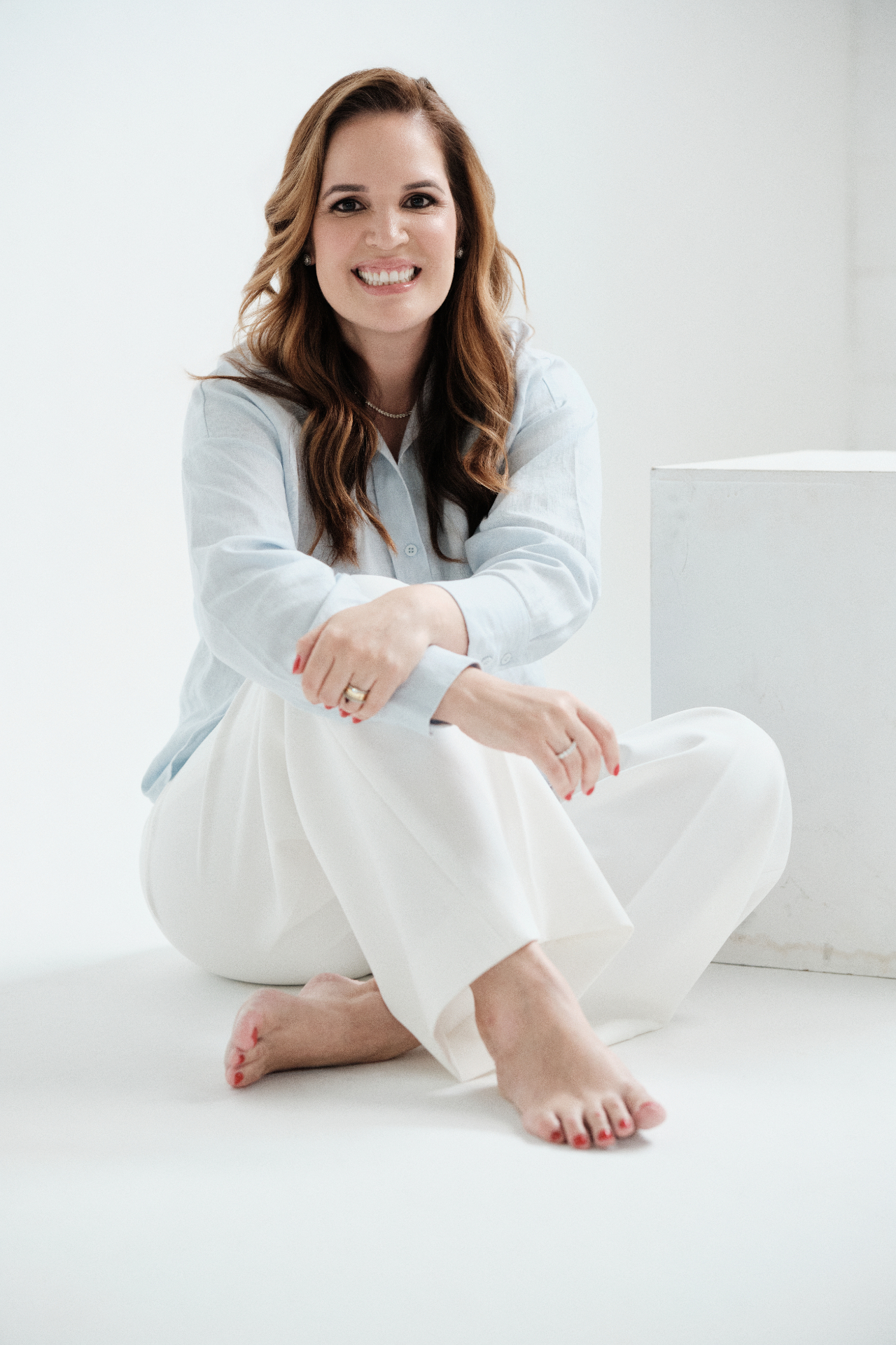 Retrato profissional da Dra. Lorena Meneguetti, cardiologista